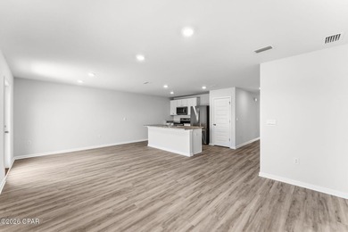 PRICE REDUCTION! Experience peaceful pondfront living in this - photo 18