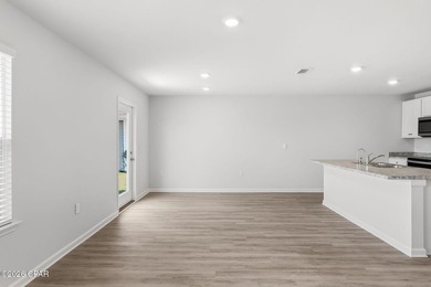PRICE REDUCTION! Experience peaceful pondfront living in this - photo 19