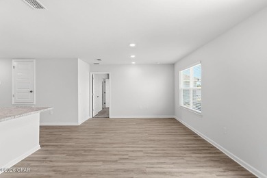 PRICE REDUCTION! Experience peaceful pondfront living in this - photo 20