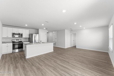 PRICE REDUCTION! Experience peaceful pondfront living in this - photo 21