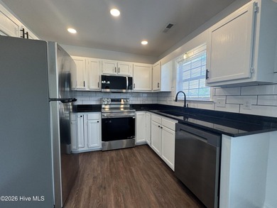 Welcome to 2604 Larne Court, nestled in the desirable community - photo 5