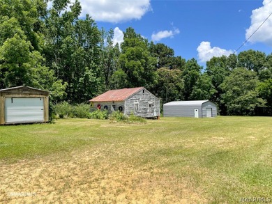 GREAT price on this versatile property...Metal Roof is only 2