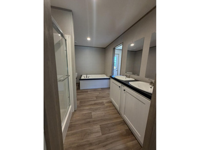 Brand new Clayton Horizon home offering 3 bedrooms, 2 full baths - photo 13