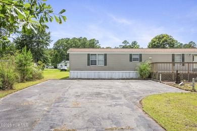 This 3 bedroom, 2 bathroom partially furnished home is an - photo 3