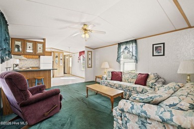 This 3 bedroom, 2 bathroom partially furnished home is an - photo 5