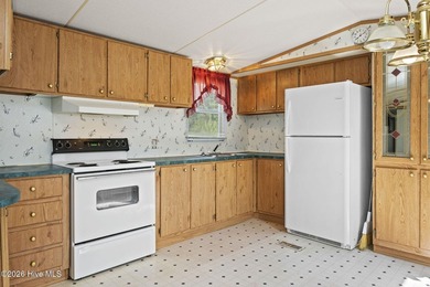 This 3 bedroom, 2 bathroom partially furnished home is an - photo 8