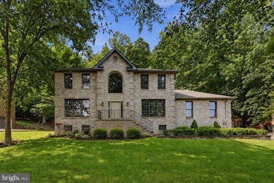 Welcome to this exceptional all-brick Colonial nestled on one of - photo 1