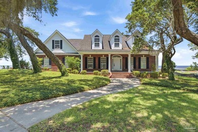 Welcome to this charming colonial-style, bay-front estate - - photo 1