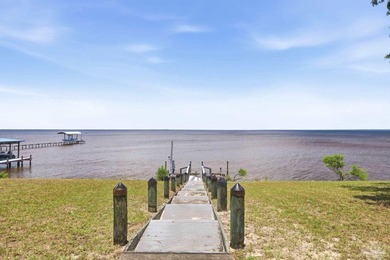 Welcome to this charming colonial-style, bay-front estate - - photo 3