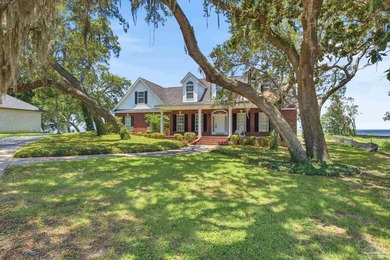 Welcome to this charming colonial-style, bay-front estate - - photo 4