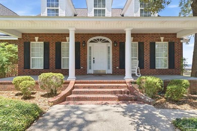 Welcome to this charming colonial-style, bay-front estate - - photo 8