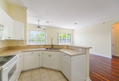 Step into a light-filled residence nestled within a - photo 11