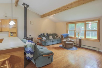 Nestled in the woods on beautifully landscaped grounds, this - photo 12