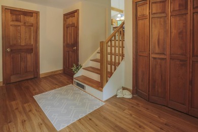Nestled in the woods on beautifully landscaped grounds, this - photo 14