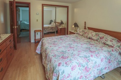 Nestled in the woods on beautifully landscaped grounds, this - photo 15