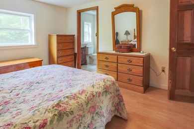 Nestled in the woods on beautifully landscaped grounds, this - photo 16