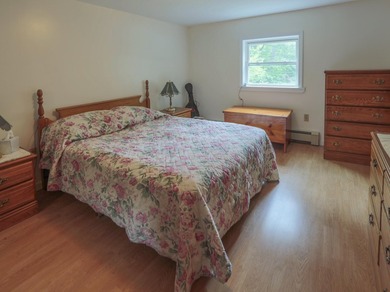 Nestled in the woods on beautifully landscaped grounds, this - photo 17