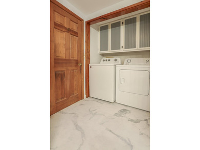 Nestled in the woods on beautifully landscaped grounds, this - photo 25