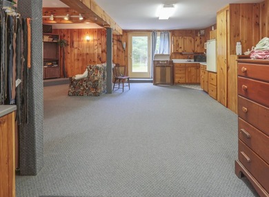 Nestled in the woods on beautifully landscaped grounds, this - photo 30
