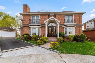 This young Center Hall Brick Colonial offers a spacious and - photo 1