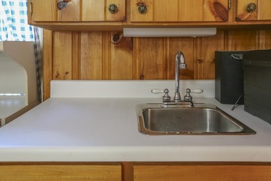 Nestled in the woods on beautifully landscaped grounds, this - photo 32