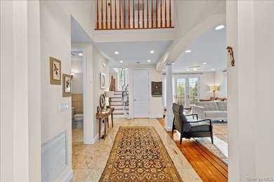 This young Center Hall Brick Colonial offers a spacious and - photo 4