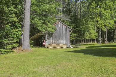 Nestled in the woods on beautifully landscaped grounds, this - photo 41