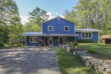 Nestled in the woods on beautifully landscaped grounds, this - photo 45