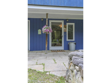 Nestled in the woods on beautifully landscaped grounds, this - photo 46