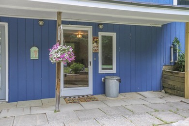 Nestled in the woods on beautifully landscaped grounds, this - photo 47