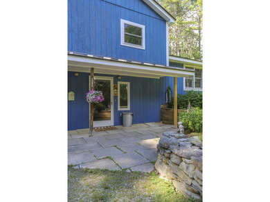 Nestled in the woods on beautifully landscaped grounds, this - photo 48