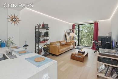 Welcome to modern living at 37-14 34th St in vibrant Queens, NY! - photo 1