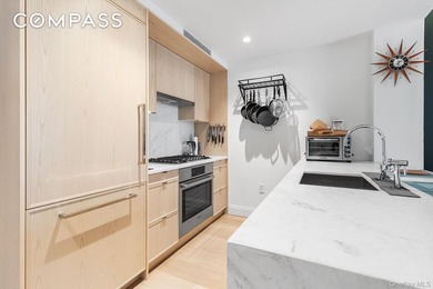 Welcome to modern living at 37-14 34th St in vibrant Queens, NY! - photo 2