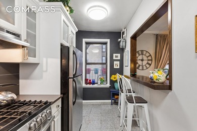 RARE TOP FLOOR TREASURE A gracious entry foyer invites you into - photo 6