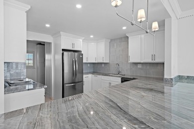 Experience an exceptional standard of Gulf-front living in this - photo 11