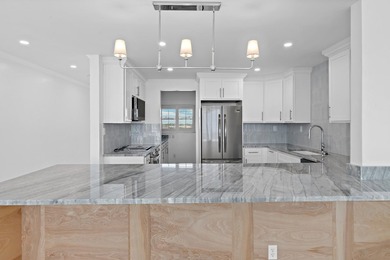 Experience an exceptional standard of Gulf-front living in this - photo 12
