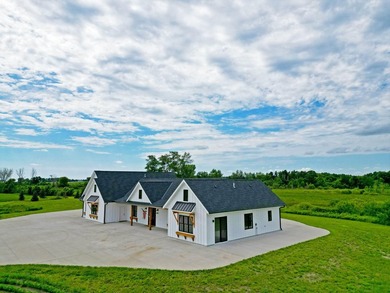 Set on 85 picturesque acres with approximately 35 tillable acres - photo 2