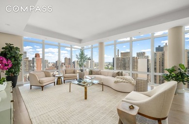 Perched atop the 26th floor of The Charles Condominium, this - photo 2