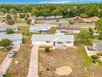 Welcome to this wonderful Gated Community! This well-maintained - photo 3