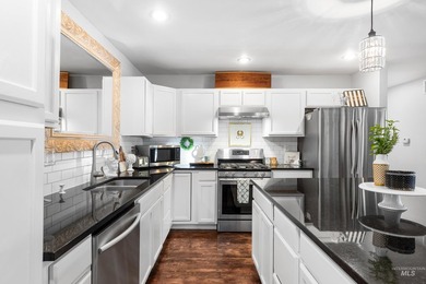 NEW roof, cabinetry, countertops, carpet, paint, trim, doors