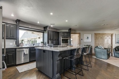 Nestled on a beautiful lot with amazing water views, this - photo 25
