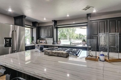 Nestled on a beautiful lot with amazing water views, this - photo 26