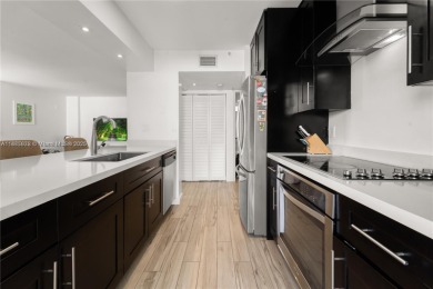 Completely remodeled 1-bedroom, 1-bath corner penthouse in the