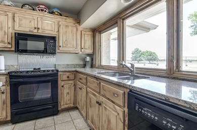 Nestled on a beautiful lot with amazing water views, this - photo 37