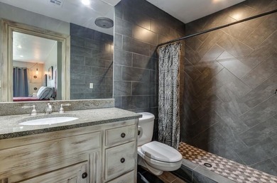 Nestled on a beautiful lot with amazing water views, this - photo 40