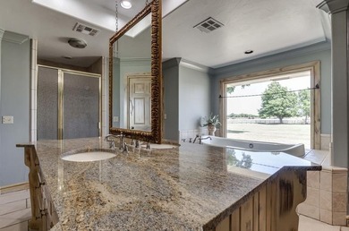 Nestled on a beautiful lot with amazing water views, this - photo 44