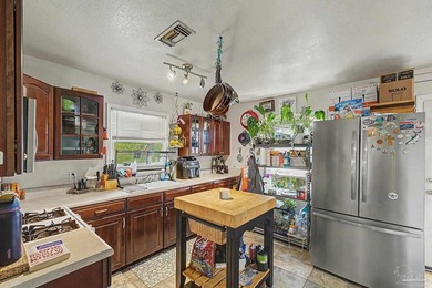 INVESTOR OPPORTUNITY ON BAYOU CHICO! Rare chance to own a unique - photo 6