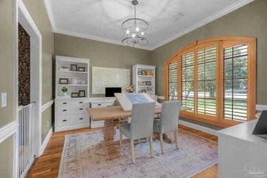 Tucked away on nearly two acres on Soundside Drive, this - photo 4