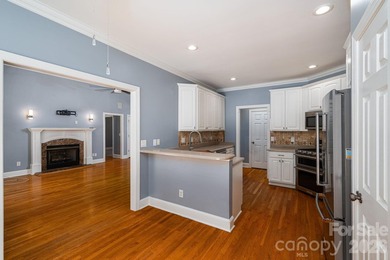Welcome to this beautifully maintained home nestled on just over - photo 11