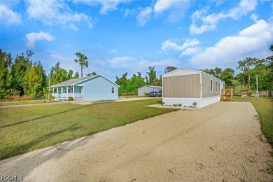 Situated on over half an acre, this pristine three-bedroom - photo 21